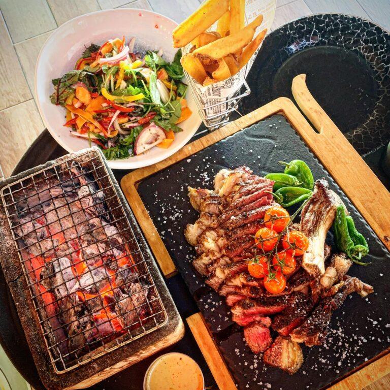Indulge in a Memorable Meal at Divot Gastro Bar: Where Food, Views, and Elegance Meet