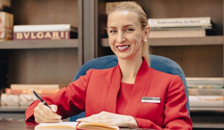 Embracing Elegance: The Unforgettable Legacy of Kempinski’s Lady in Red