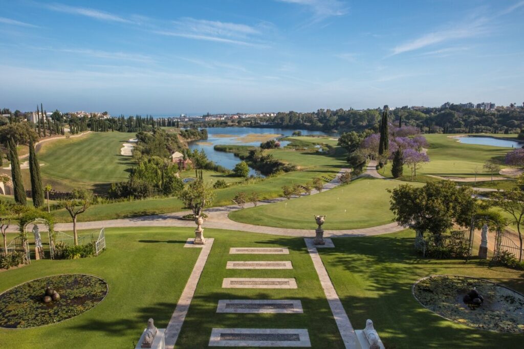 Spectacular view across the golf courses at Anantara Villa Padierna Palace, demonstrating why it is the ultimate luxury Marbella golf resort